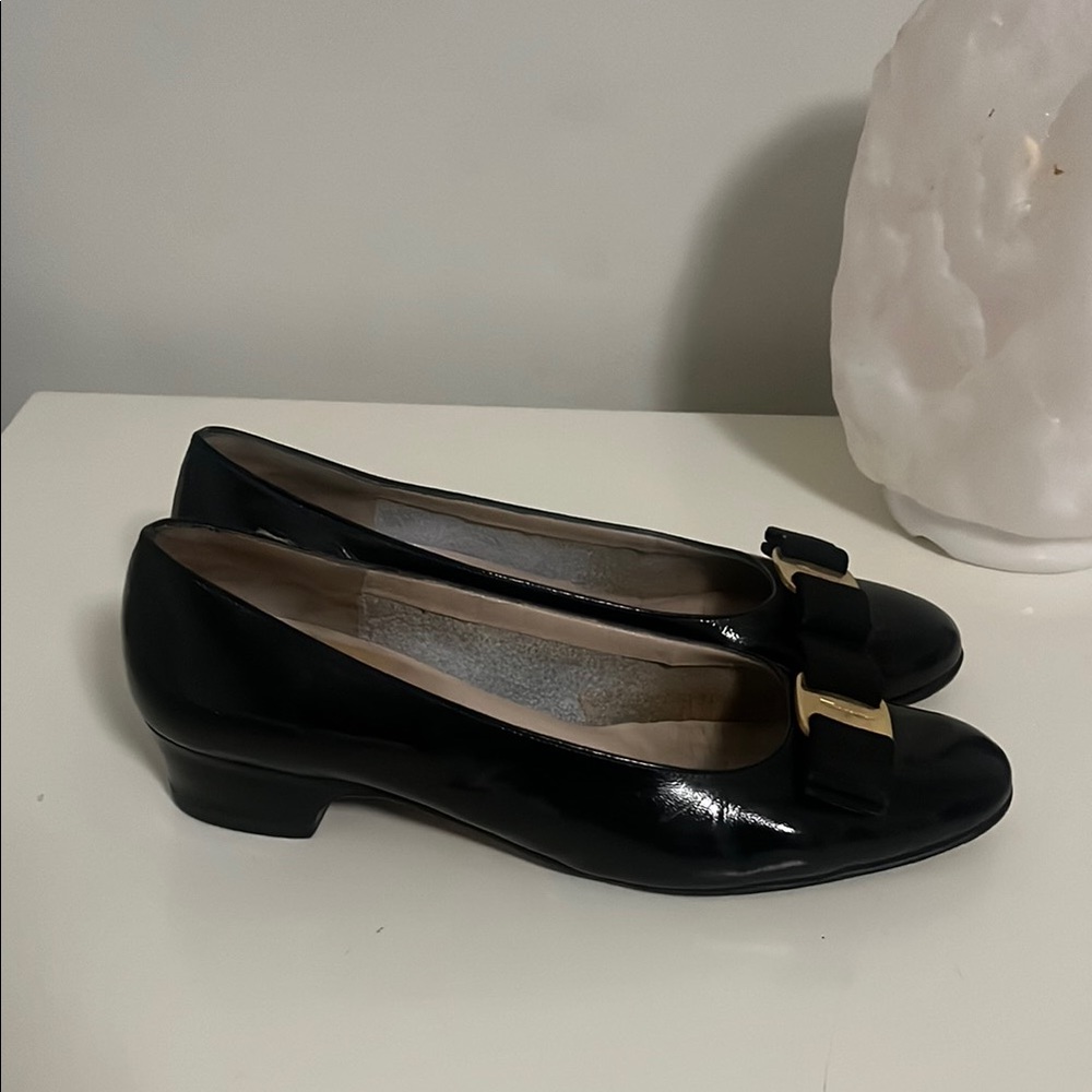 Salvatore Ferragamo Black and Gold Flats with heel and Rounded Toe & Bow Detail